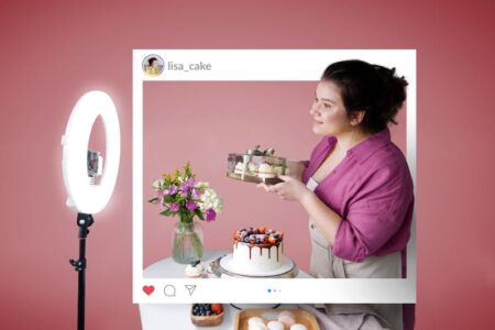 Small busines owner taking photos of a cake