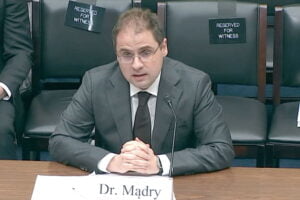 Aleksander Mądry in a congressional hearing